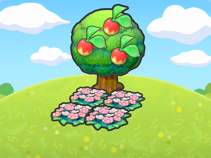 Parterre de fleurs sous un arbre